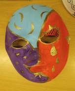 red blue purple mask with gold detail
