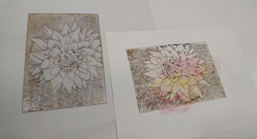 An etching plate of a flower and its print